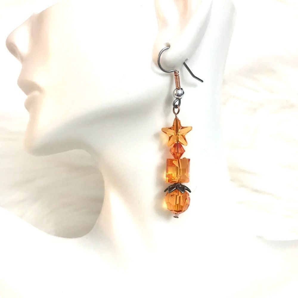 Orange beaded dangle earrings